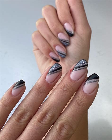 nail designs black white and silver|black nails with white cross.